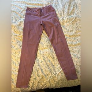 Sand Cloud eco pocket leggings in a pretty pink/purple color